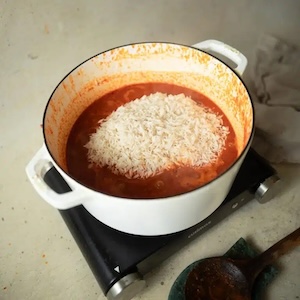 jollof rice soaking in stew